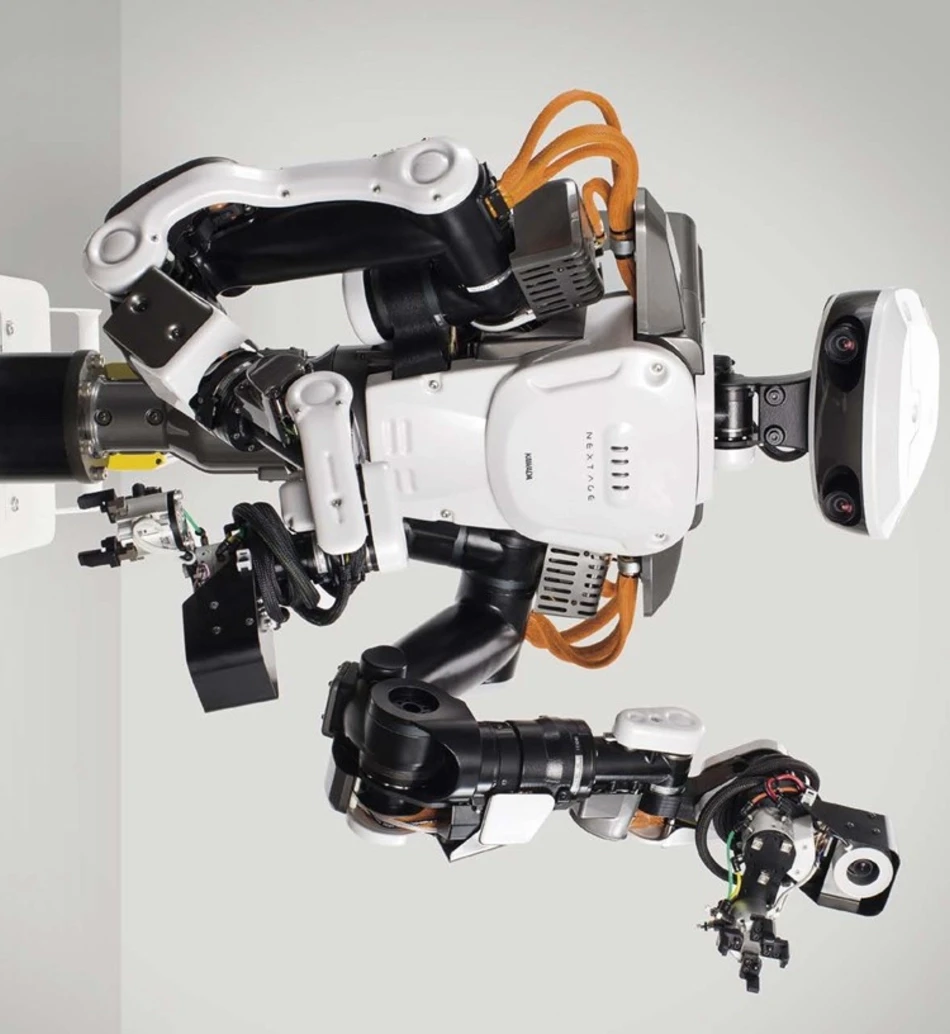 a humanoid alongside workers