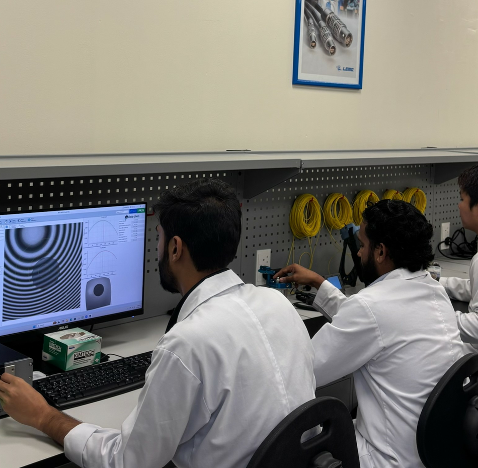Picture from LEMO Middle East of 3 Employees Assembling and testing cables
